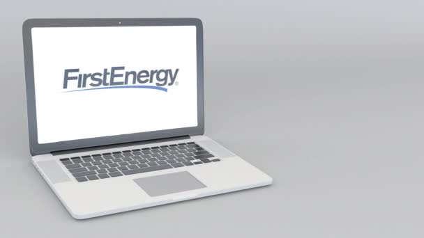 Abrir e fechar laptop com logotipo Firstenergy. Animação editorial 4K — Vídeo de Stock