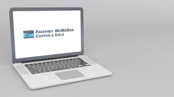 Apertura e chiusura laptop con logo Freeport-Mcmoran. Animazione editoriale 4K — Video Stock