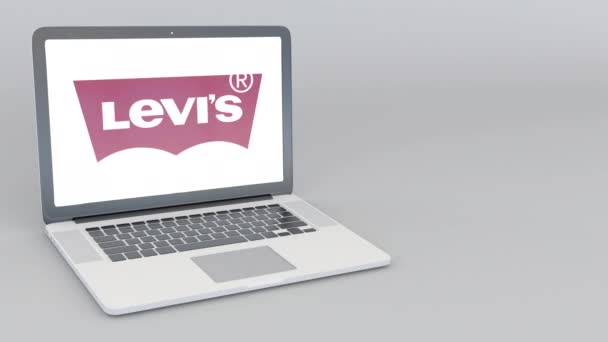 Ordinateur portable ouverture et fermeture avec logo Levi Strauss Co. Animation éditoriale 4K — Video