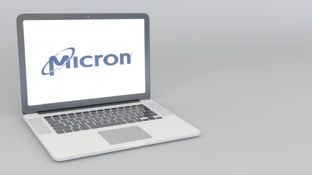 Otwieranie i zamykanie laptopa z logo Micron Technology. 4 k redakcji animacji — Wideo stockowe