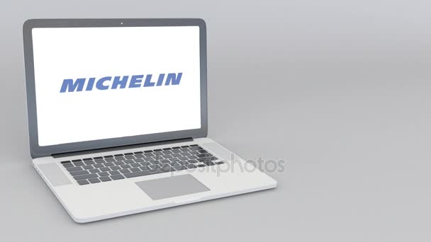 Otevírání a zavírání notebooku s logem Michelin. 4 k redakční animace — Stock video