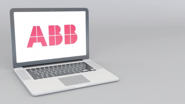 열고 그리고 Abb 그룹 로고와 함께 노트북을 닫는입니다. 4 k 편집 애니메이션 — 비디오