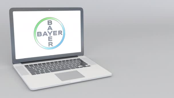 Открытие и закрытие ноутбука с логотипом Bayer AG. Редакция 4K — стоковое видео