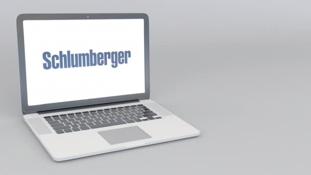 Portátil de apertura y cierre con logotipo de Schlumberger. Animación editorial 4K — Vídeos de Stock