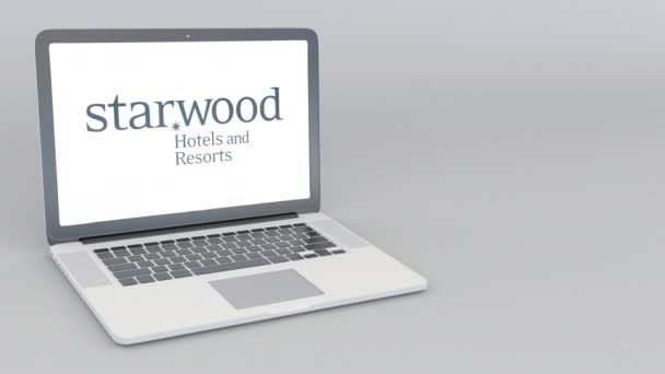 Abrir e fechar laptop com logotipo Starwood. Animação editorial 4K — Vídeo de Stock