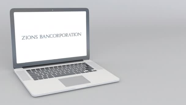 Openen en sluiten van laptop met Zions Bancorporation logo. 4 k redactionele animatie — Stockvideo