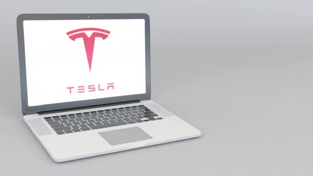 Otevírání a zavírání notebooku s Tesla, Inc. logo. 4 k redakční animace — Stock video