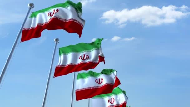 Несколько размахивающих флагами Ирана против голубого неба, бесшовная петля — стоковое видео