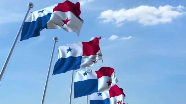 Multiple waving flags of Panama against the blue sky, seamless loop — Stock Video