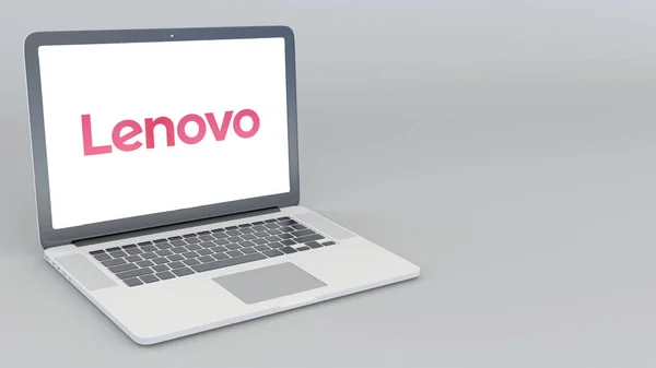 Portátil de apertura y cierre con logo Lenovo. Renderizado 3D editorial 4K —  Fotos de Stock