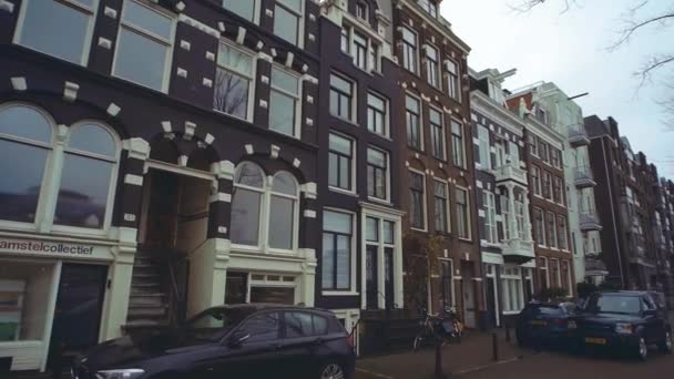 AMSTERDAM, NETHERLANDS - DECEMBER 26, 2017. Typical street in the city — Stock Video