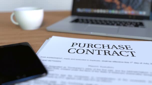 Copy of purchase contract on the desk — Stock Video