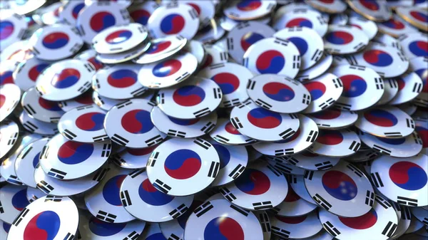Haufen Abzeichen mit Flaggen Südkoreas. 3D-Darstellung — Stockfoto