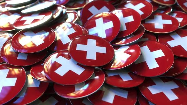 Stapel von Abzeichen mit Schweizer Flaggen. 3D-Darstellung — Stockfoto