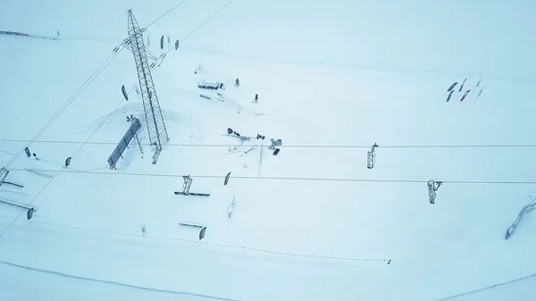 BIALKA TATRZANSKA, POLAND - FEBRUARY 3, 2018. Aerial travelling shot of an empy alpine ski lift or chairlift — Stock Photo, Image