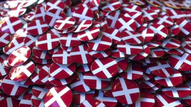 Pile of badges featuring flags of Denmark — Stock Video