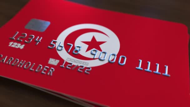 Plástico cartão bancário com bandeira da Tunísia. Animação relacionada com o sistema bancário nacional — Vídeo de Stock