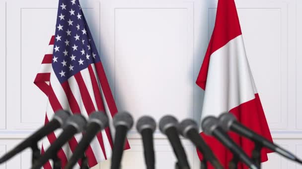 Flags of the USA and Peru at international meeting or negotiations press conference — Stock Video