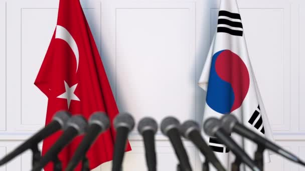 Uluslararası Toplantı veya anlaşmalarını basın toplantısında, Türkiye ve Kore bayrakları — Stok video