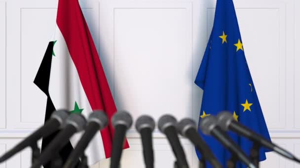 Bandiere della Siria e dell'Unione europea alla riunione internazionale o alla conferenza stampa dei negoziati — Video Stock