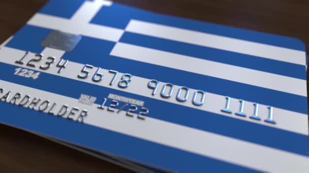 Plastikkarte mit griechischer Flagge. Animation zum nationalen Bankensystem — Stockvideo