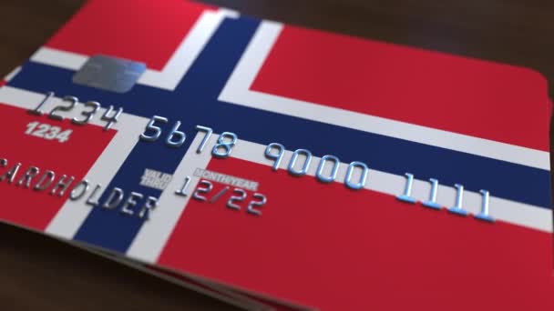 Tarjeta bancaria de plástico con bandera de Noruega. Animación relacionada con el sistema bancario nacional — Vídeo de stock