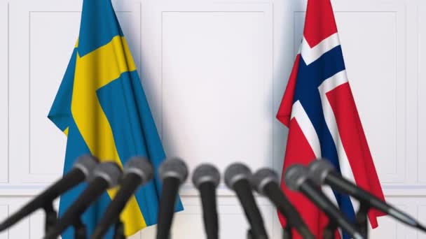 Flagi, Szwecji i Norwegii, na międzynarodowej konferencji prasowej spotkania lub negocjacji — Wideo stockowe