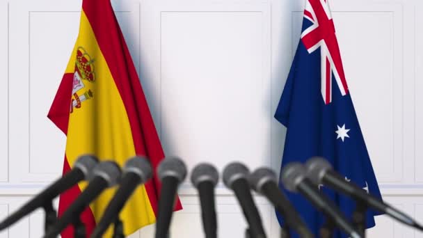 Bandiere della Spagna e dell'Australia alla riunione internazionale o alla conferenza stampa dei negoziati — Video Stock