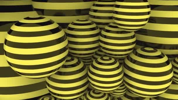 Черные и желтые полосатые шары петлевидный фон движения — стоковое видео