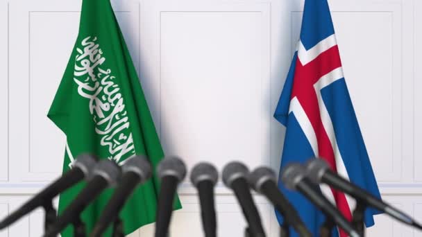 Banderas de Arabia Saudita e Islandia en reunión internacional o en conferencia de prensa de negociaciones — Vídeos de Stock