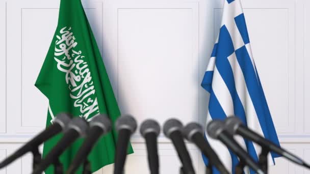 Σημαίες της Σαουδικής Αραβίας και της Ελλάδας στα διεθνή συνέντευξη τύπου συνάντησης ή διαπραγματεύσεις — Αρχείο Βίντεο