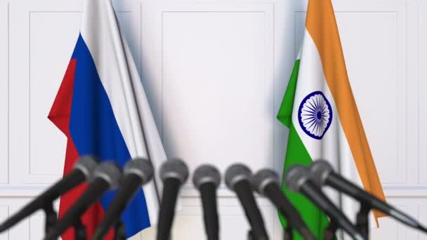 Flags of Russia and India at international meeting or negotiations press conference — Stock Video