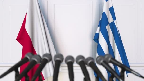 Bandeiras da Polónia e da Grécia em reunião internacional ou negociações conferência de imprensa — Vídeo de Stock