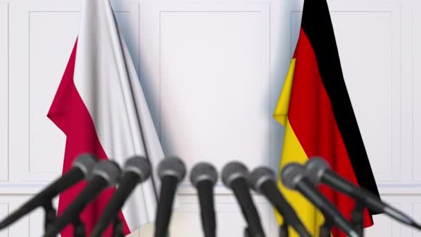 Flagi Polski i Niemiec na międzynarodowej konferencji prasowej spotkania lub negocjacji — Wideo stockowe