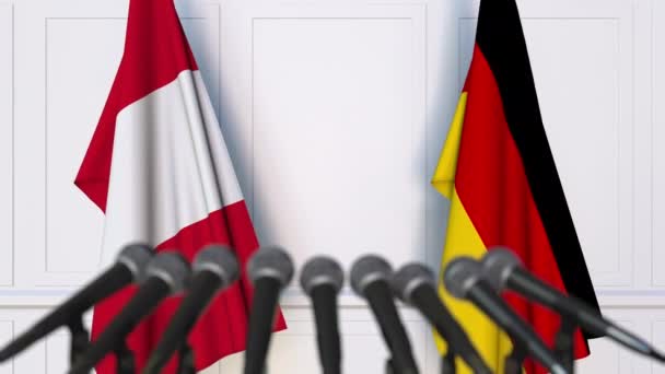 ธงของเปรูและเยอรมนีในการประชุมนานาชาติหรือการเจรจาแถลงข่าว — วีดีโอสต็อก