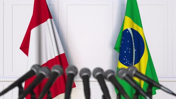Bandiere del Perù e del Brasile alla riunione internazionale o alla conferenza stampa dei negoziati — Video Stock