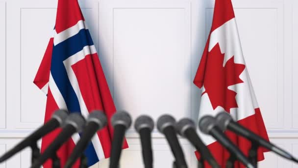 Zászlók, Norvégia és Kanada nemzetközi értekezlet vagy tárgyalások sajtótájékoztatón — Stock videók