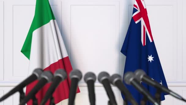 Flaggen Italiens und Australiens bei internationalen Treffen oder Verhandlungen — Stockvideo