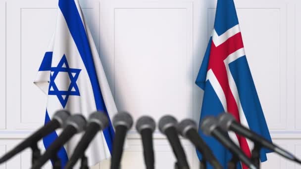 国際会議や交渉の記者会見でイスラエル、アイスランドの国旗 — ストック動画