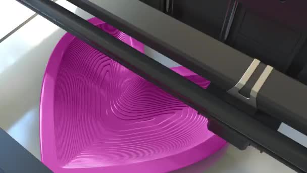 Друк пластикової рожевої форми серця з 3D принтером, проміжок часу анімації — стокове відео