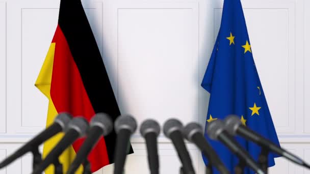 德国和欧洲联盟在国际会议或谈判新闻发布会上的旗帜 — 图库视频影像