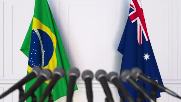 Flagi, Brazylii i Australii, na międzynarodowej konferencji prasowej spotkania lub negocjacji — Wideo stockowe