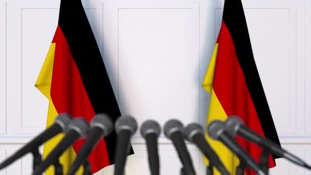 Deutsche offizielle Pressekonferenz. Deutschland-Fahnen und Mikrofone. Konzeptionelle Animation — Stockvideo