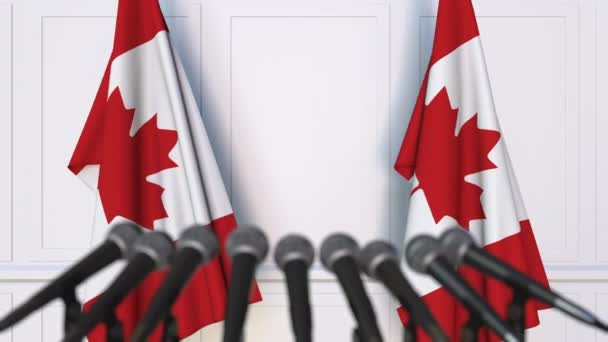 Kanadische offizielle Pressekonferenz. Flaggen Kanadas und Mikrofone. Konzeptionelle Animation — Stockvideo