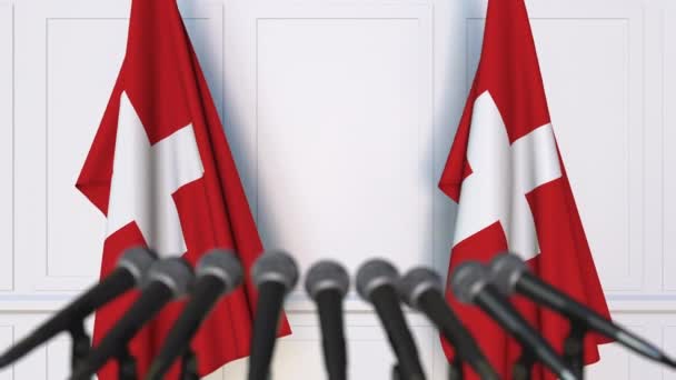 İsviçre resmi basın toplantısı. İsviçre ve mikrofonlar bayrakları. Kavramsal animasyon — Stok video
