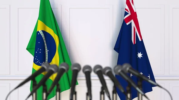 Флаги Бразилии и Австралии на международной встрече или конференции. 3D рендеринг — стоковое фото