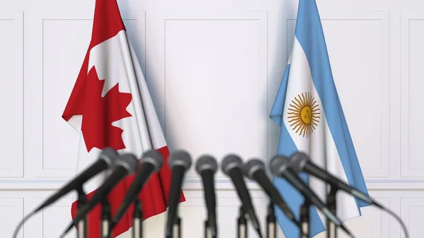 加拿大和阿根廷在国际会议或会议上的旗帜。3d 渲染 — 图库照片