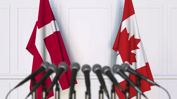 Danimarka ve Kanada bayrakları Uluslararası Toplantı veya konferans. 3D render — Stok fotoğraf