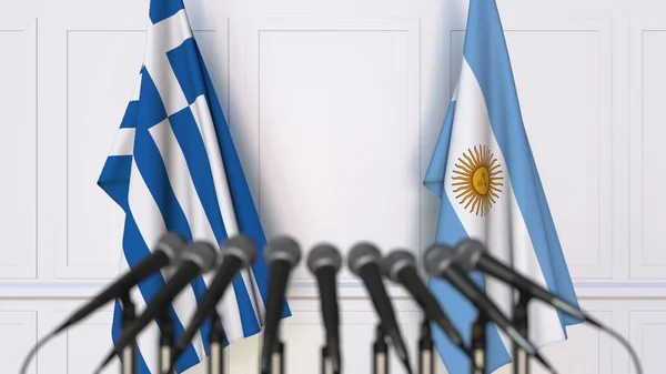 Drapeaux de la Grèce et de l'Argentine lors d'une réunion ou conférence internationale. rendu 3D — Photo