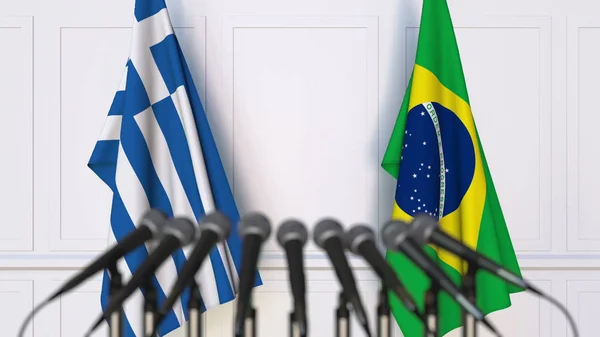 Drapeaux de la Grèce et du Brésil lors d'une réunion ou conférence internationale. rendu 3D — Photo